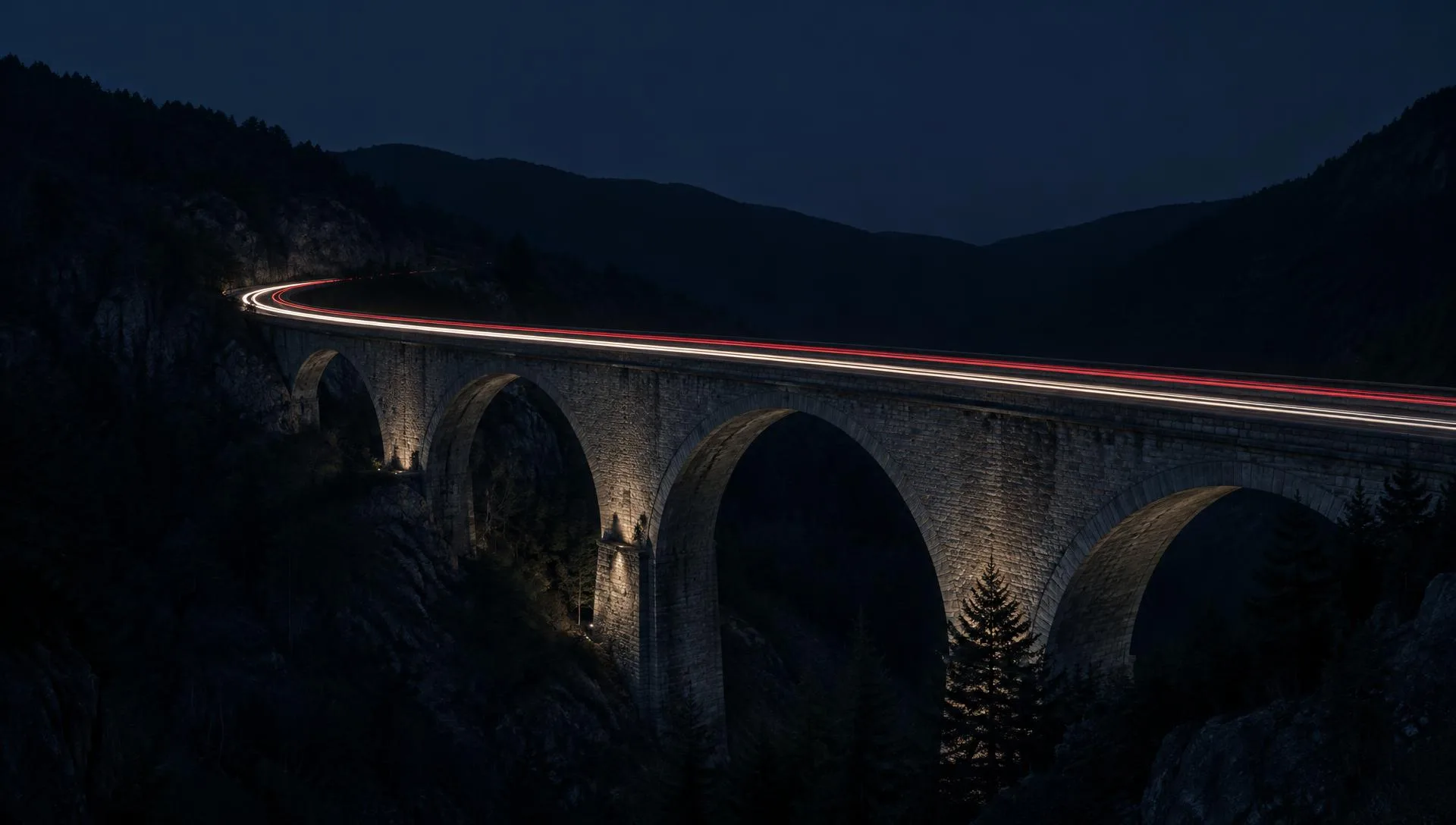 A long exposure of a road bridge at night